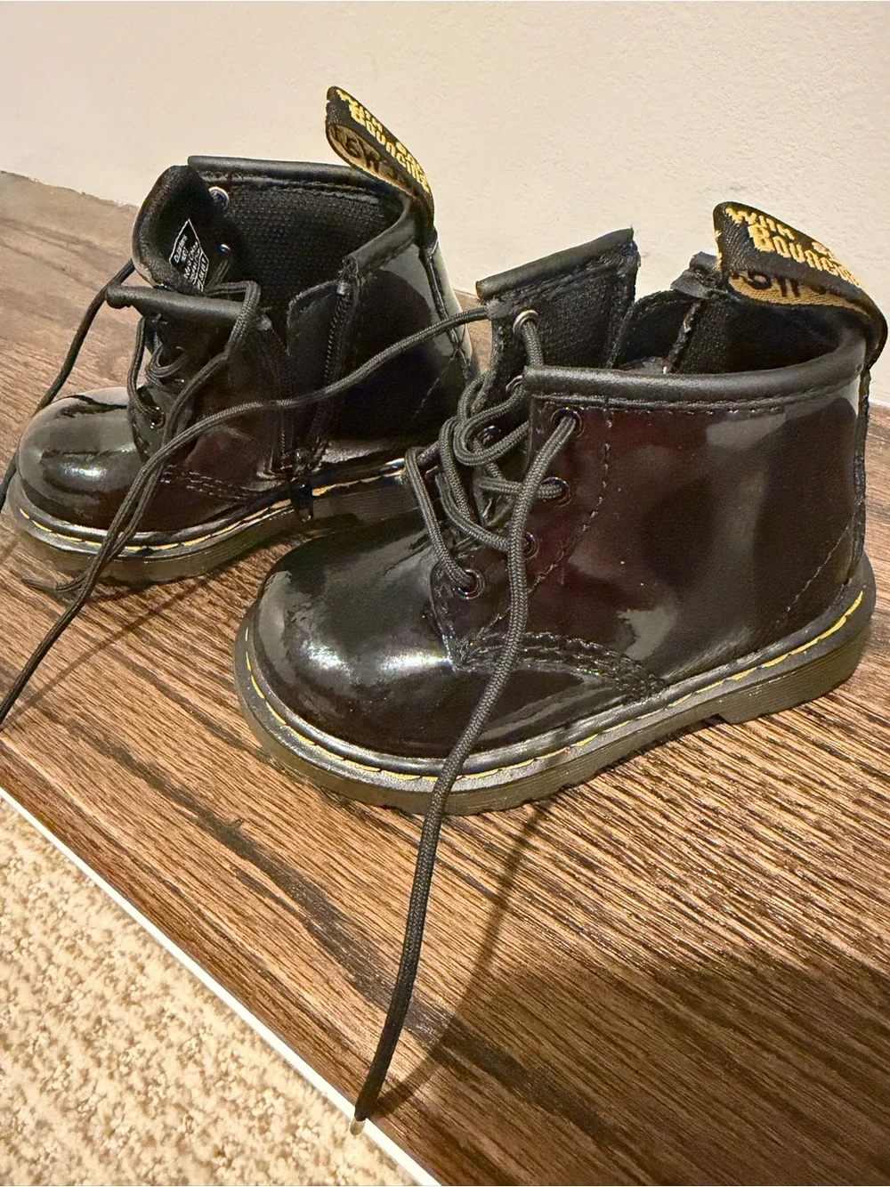 Dr. Martens Kids Black Patent Lace-Up Boots with Yellow Welt